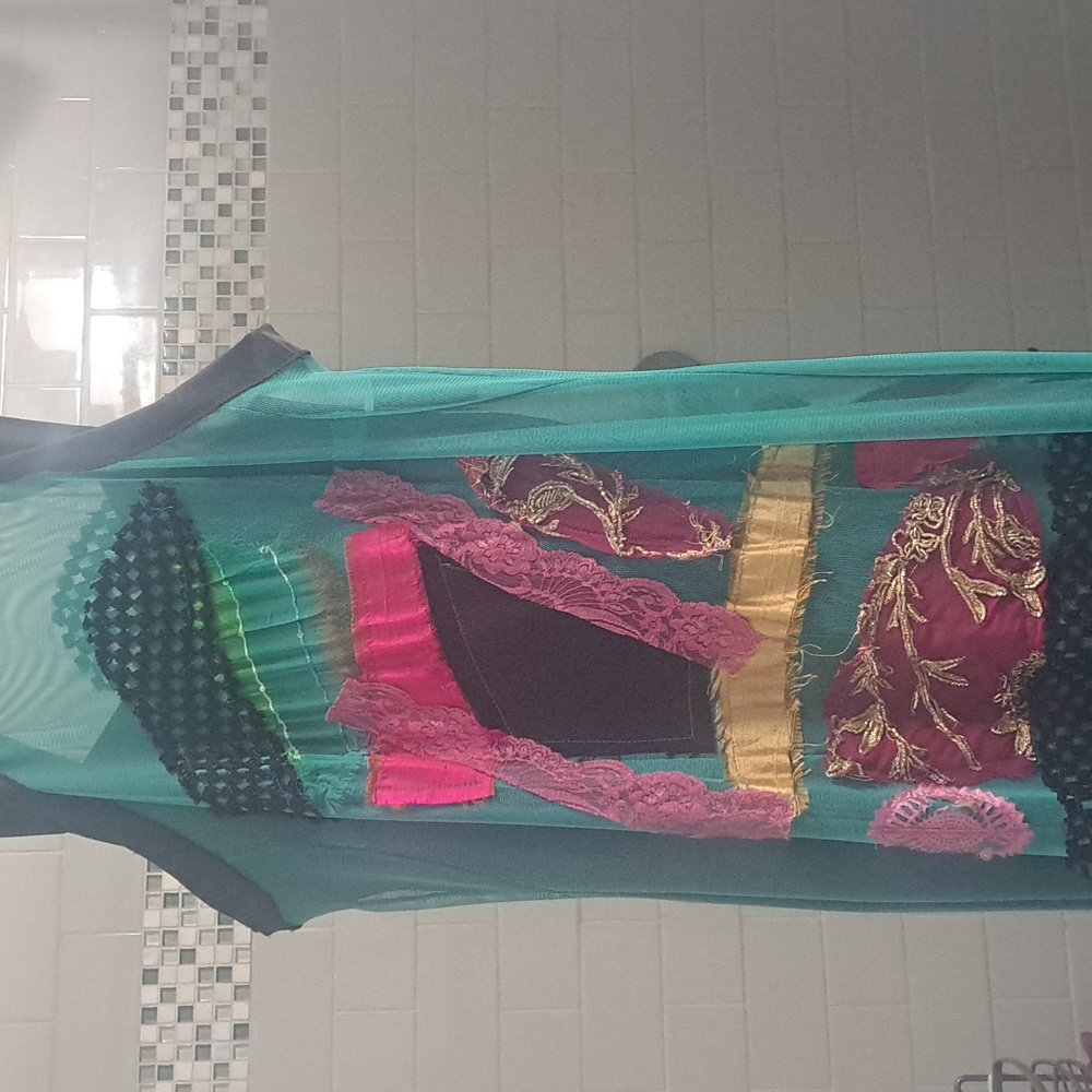 Funky turquoise dress. A Dora Cavazi brand from an exclusive boutique in Greece.